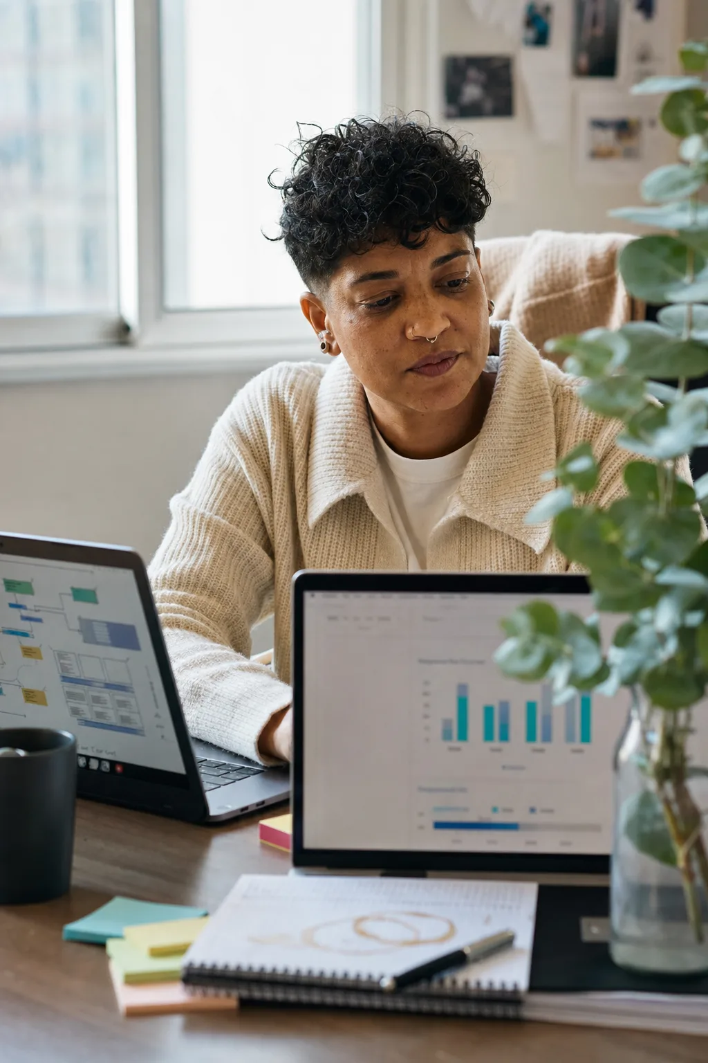 A VP of Content reviewing a content roadmap and metrics dashboard at their desk.