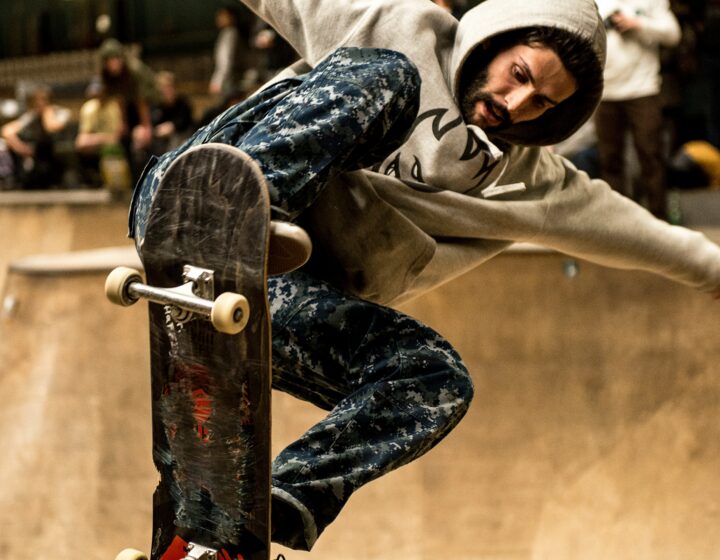 This is an image of a man skateboarding for an article on diverse stock photos for Contently